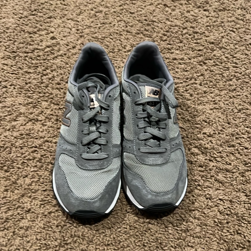 Gray/rose gold new balance sneakers 311